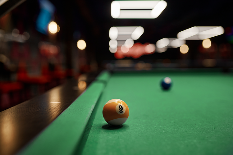 billiard ball on pool table