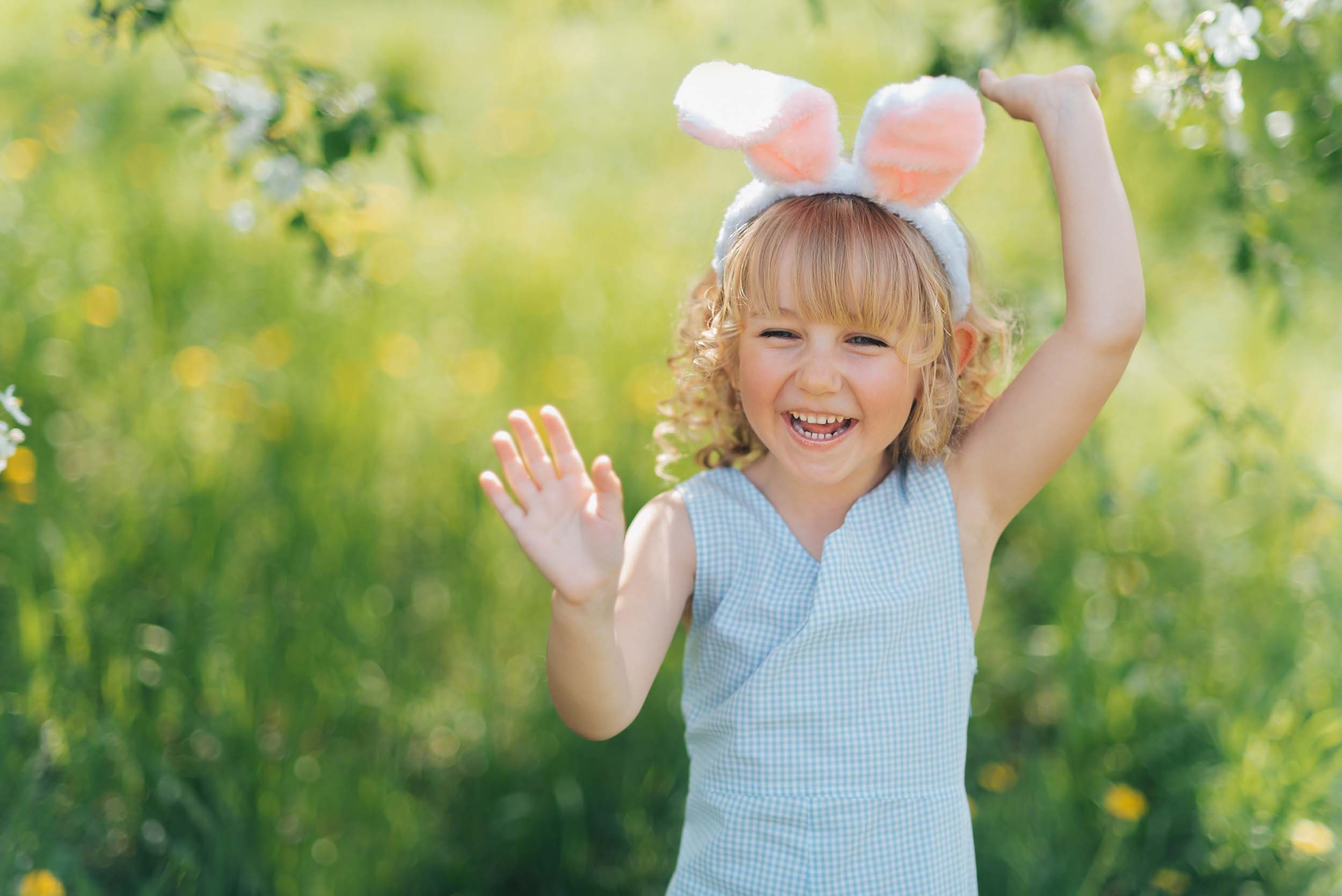 Cute,Funny,Girl,With,Easter,Eggs,And,Bunny,Ears,At