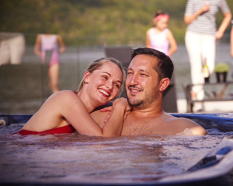 Couple relaxing in a hot tub