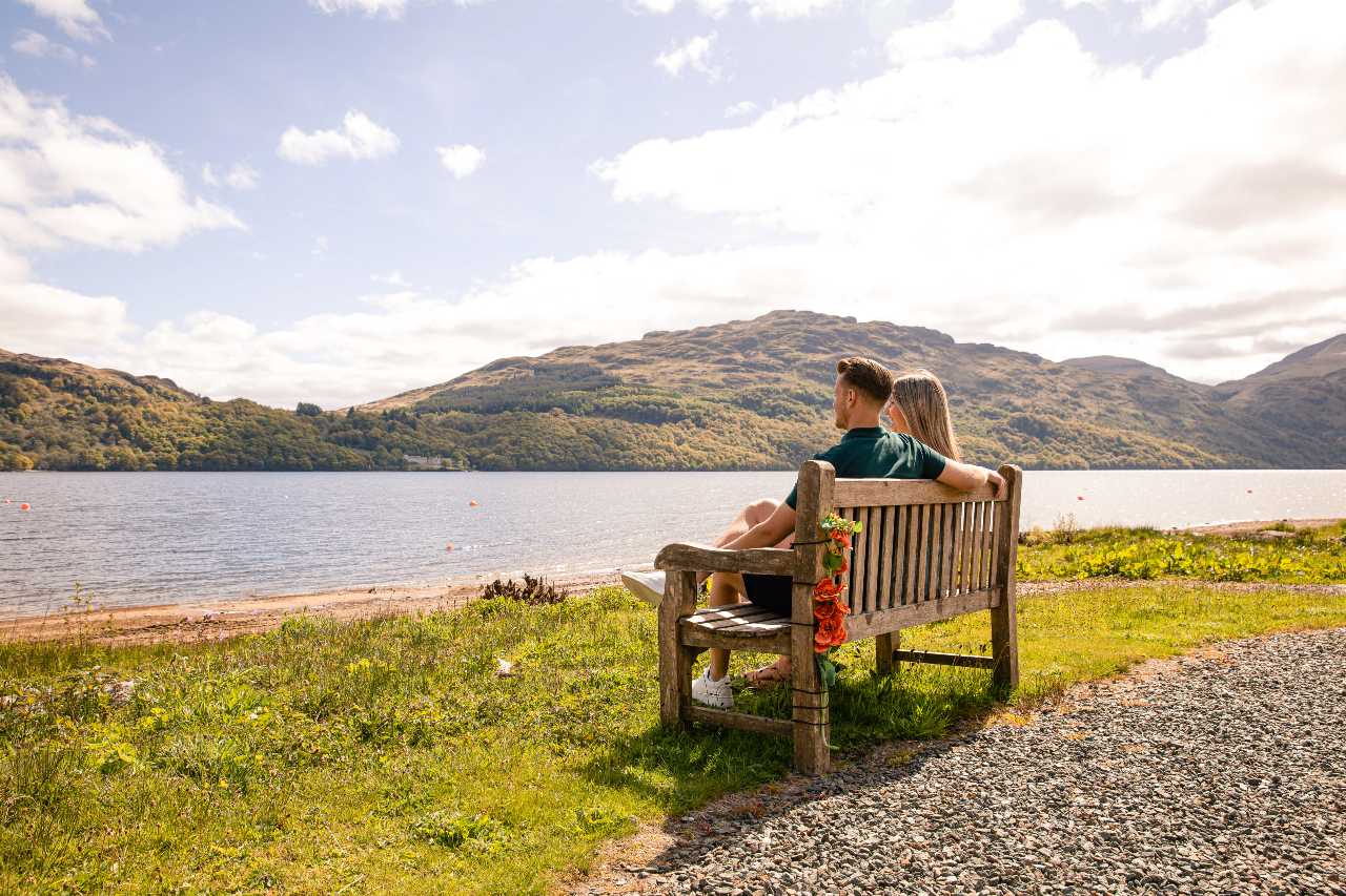 Admiring the view across Loch Lomond from a bench