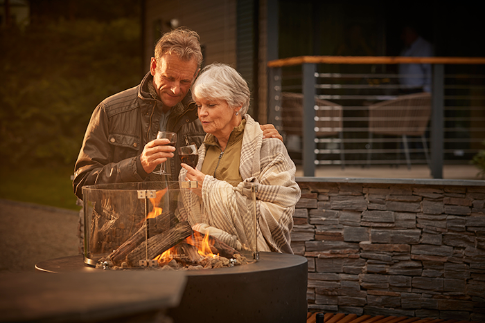 Older couple on fire pit
